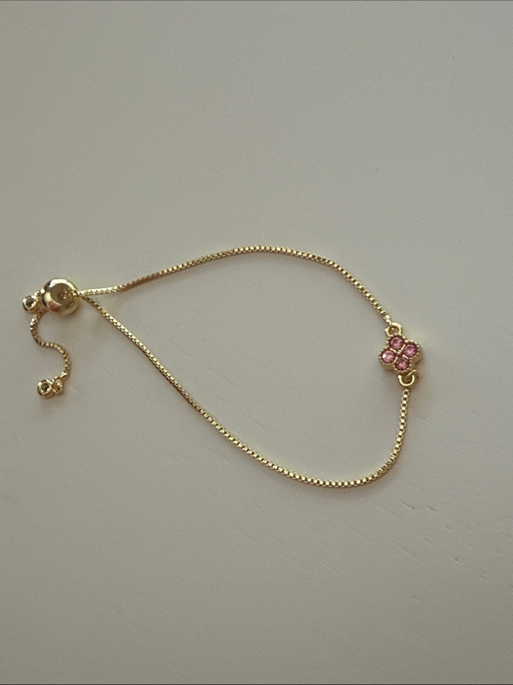 Gold-Tone Adjustable Bracelet Pink Flower Accent
